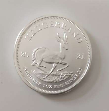 {ECONO BID} 2021 KRUGERRAND 1 OZ SILVER IN CAPSULE (UNC)