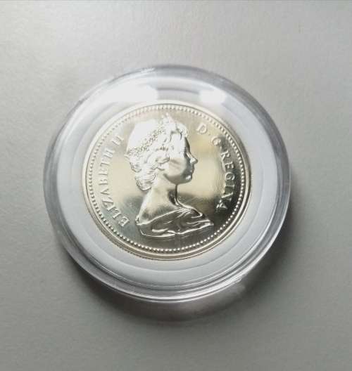 RARE CANADIAN CALGARY SILVER DOLLAR (1875-1975) COIN - IN CAPSULE