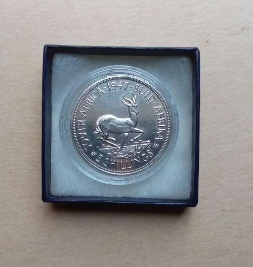 RARE 1947 SOUTH AFRICAN SILVER 5 SCHILLINGS COIN (ENCAPSULATED) AND COMES IN A BOX