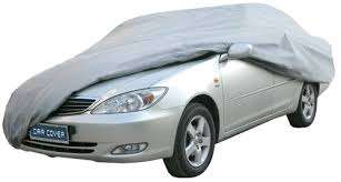 High Quality Car Cover. All Weather Resistant. One size fits all cars. Grey color