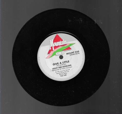 GIVE A LITTLE- LESLEY RAE DOWLING (SEVEN SINGLE)