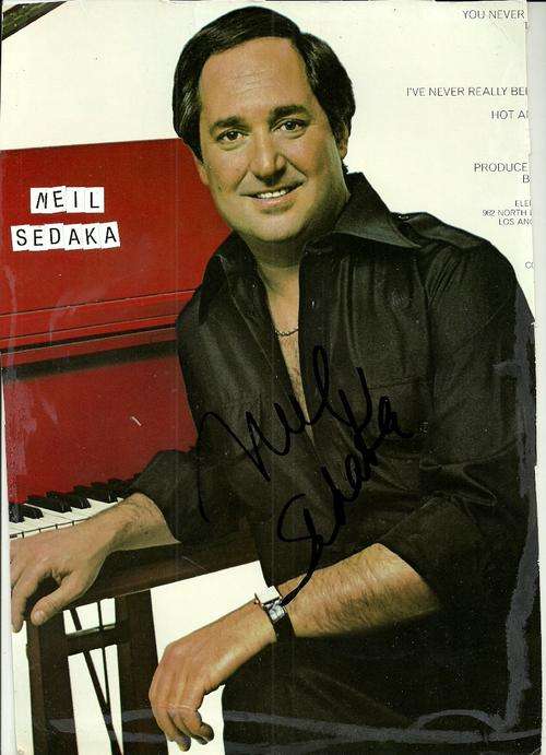 Neil Sedaka signed 12 x 8 Colour Magazine Portrait Board