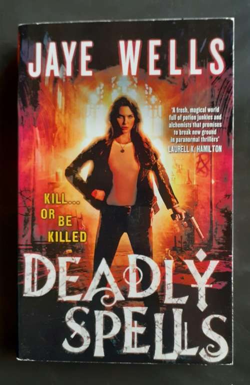 Deadly Spells by Jaye Wells
