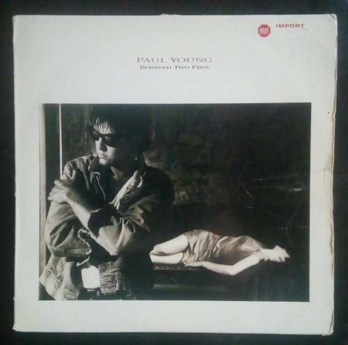 Paul Young - Between Two Fires LP Vinyl Record - USA Pressing