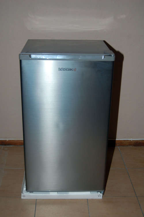 A silver portable Logic Mini bar fridge 120LT available for sale