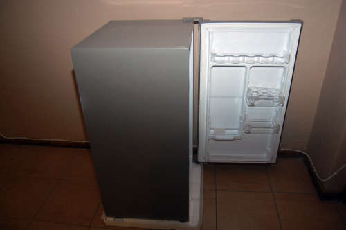 A silver portable Logic Mini bar fridge 120LT available for sale