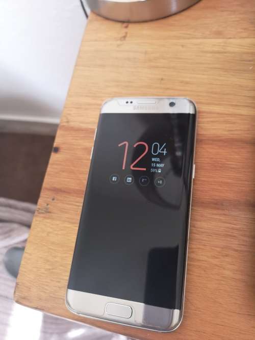 Samsung Galaxy S7 Edge 32 GB Titanium Silver (Excellent Condition with box, charger & BT earphones)