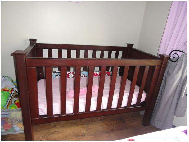 Mahogany Bradley cot - can convert to Junior bed