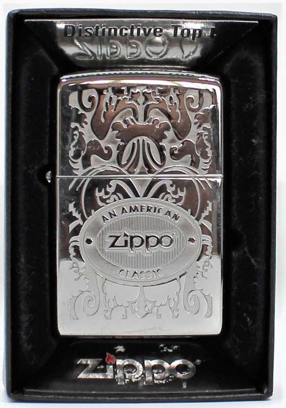 Zippo - Two Original Boxed Zippo Collectables - ""Hollywood's Leading Light"" & ""American Classic""