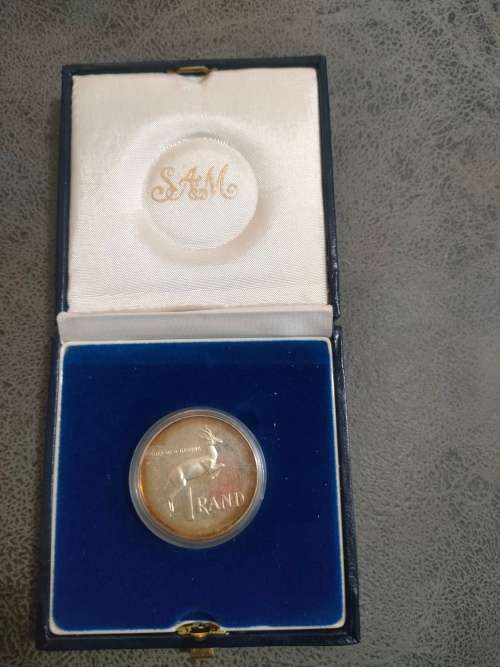 1990 Silver R1 coin in SAM box and capsule