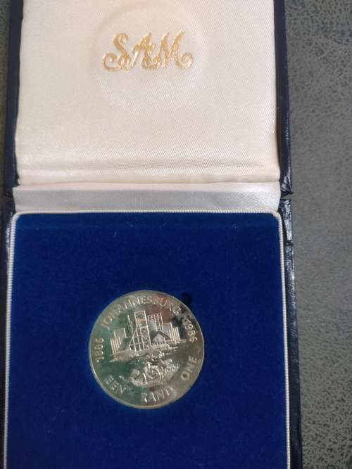 1986 Silver R1 coin in SAM box. Johannesburg