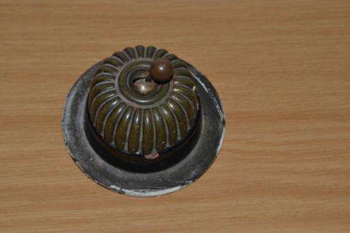 Old brass light switch.