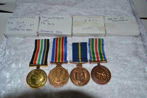 Full Size SAPS medal group of 4 to W/O P.A. Els. With issue boxes.