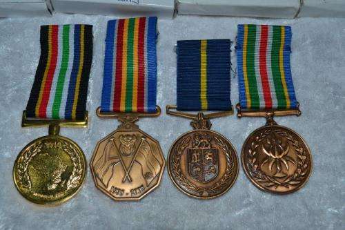 Full Size SAPS medal group of 4 to W/O P.A. Els. With issue boxes.