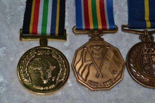 Full Size SAPS medal group of 4 to W/O P.A. Els. With issue boxes.