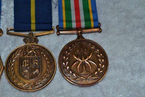 Full Size SAPS medal group of 4 to W/O P.A. Els. With issue boxes.