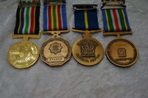 Full Size SAPS medal group of 4 to W/O P.A. Els. With issue boxes.