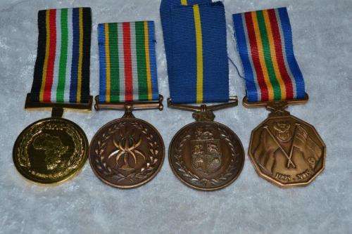Full Size SAPS medal group of 4 to W/O J.F. Els. With issue boxes.