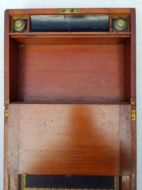 Beautiful Writing slope with Original ink bottles. Needs some work to outside.
