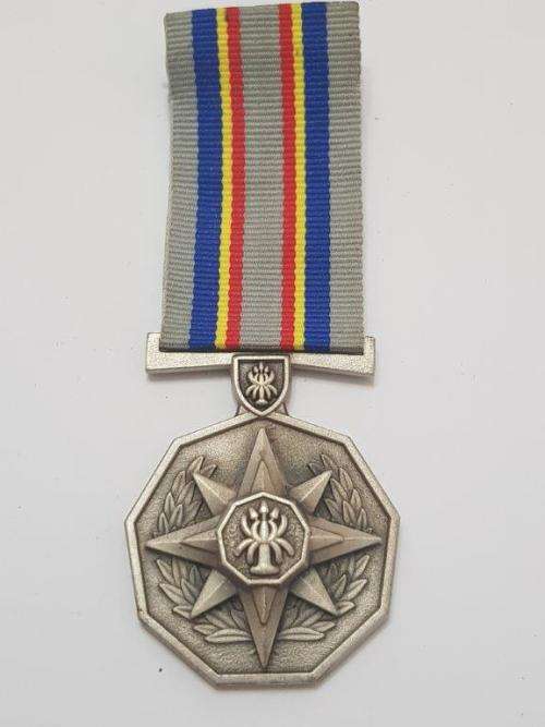 Full size SAPS 20 Year service Medal.