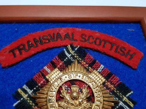Transvaal Scottish Badges on tartan backings. All lugs intact.