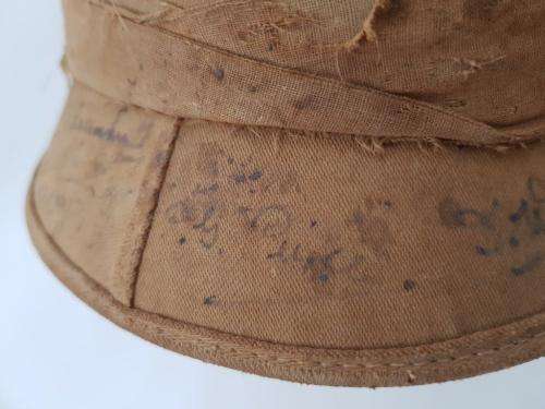 WWII Pith Helmet "Possibly DLI" with +/- 60 Signatures. Helmet has seen better days.
