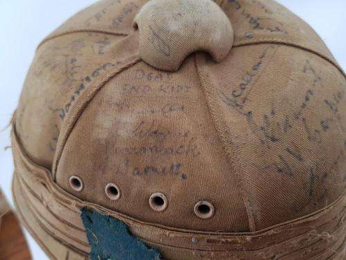 WWII Pith Helmet "Possibly DLI" with +/- 60 Signatures. Helmet has seen better days.