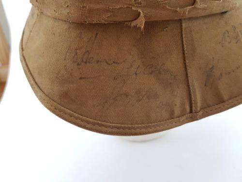 WWII Pith Helmet "Possibly DLI" with +/- 60 Signatures. Helmet has seen better days.