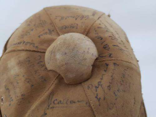 WWII Pith Helmet "Possibly DLI" with +/- 60 Signatures. Helmet has seen better days.