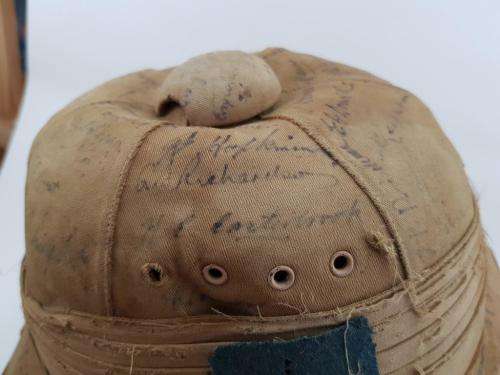 WWII Pith Helmet "Possibly DLI" with +/- 60 Signatures. Helmet has seen better days.
