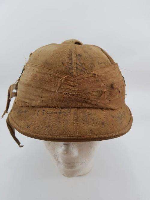 WWII Pith Helmet "Possibly DLI" with +/- 60 Signatures. Helmet has seen better days.