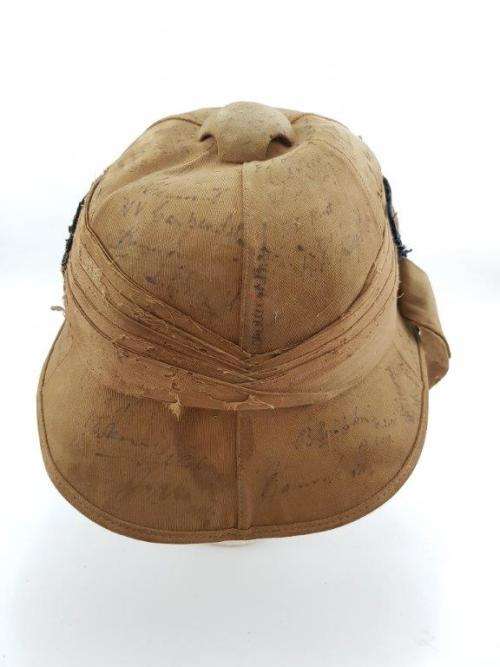 WWII Pith Helmet "Possibly DLI" with +/- 60 Signatures. Helmet has seen better days.