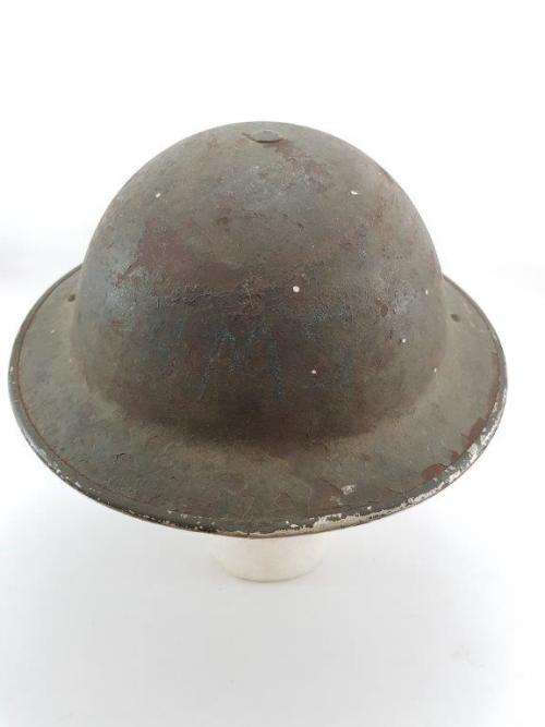 British WWII Helmet. Complete with liner and chin strap.
