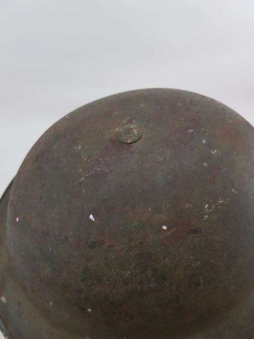 British WWII Helmet. Complete with liner and chin strap.