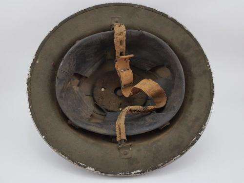 British WWII Helmet. Complete with liner and chin strap.