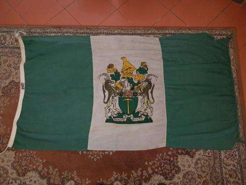 Standard size Rhodesian Flag by William Smith. Torn and toggle cut.
