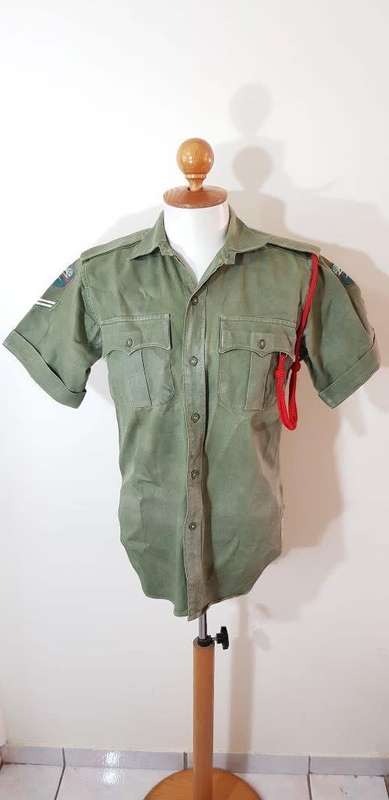 Rhodesian Olive Green Shirt with Badges and Women's Services Lanyard.