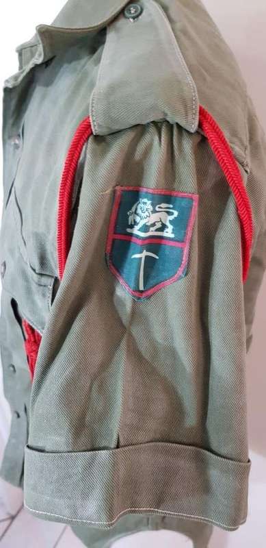 Rhodesian Olive Green Shirt with Badges and Women's Services Lanyard.