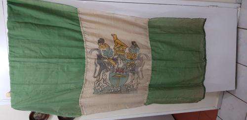 Rhodesian Flag with Partial William Smith label. Badly worn and torn.
