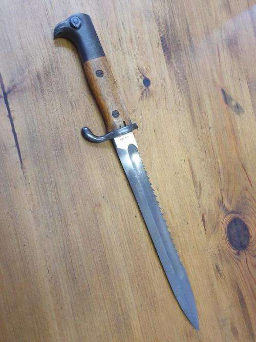 German WWI Ks98 Sawback bayonet and chest rigging.