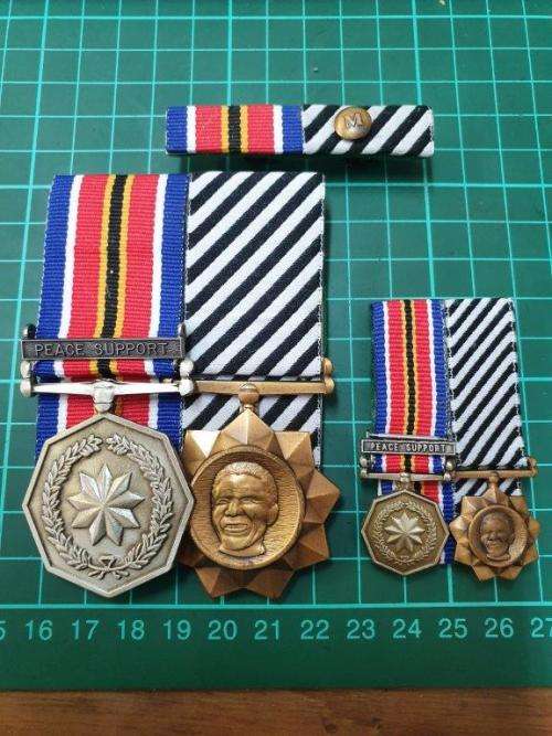 SANDF Full size and Miniature medal group. General service and Mandela medals.