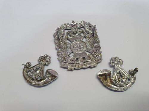 South African Witwatersrand Rifles cap and collar badges.