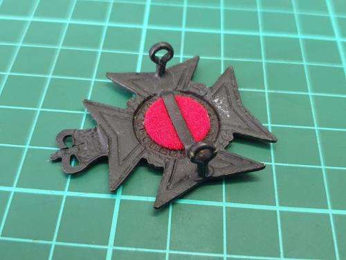 The Royal Rhodesia Regiment cap badge.