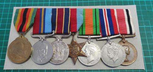 WWII and Rhodesian BSA Police group to 3317E F/R D Thomasset
