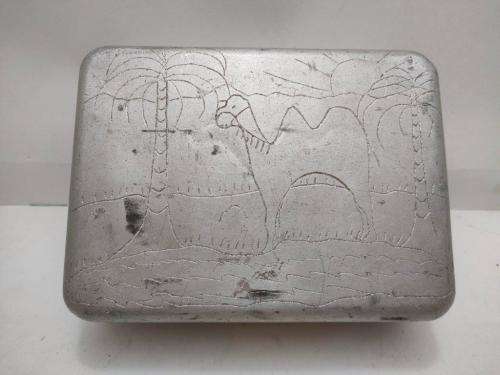 WWII Aluminum Dixie carved by bored troop/POW. SASC