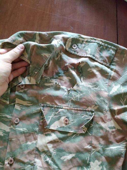 South West African Police Camo shirt with hole. Very worn and thin.