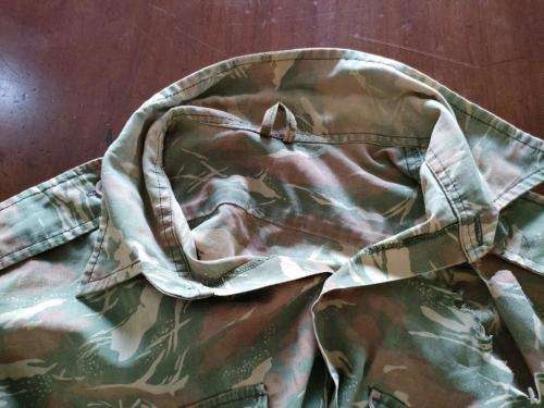 South West African Police Camo shirt with hole. Very worn and thin.