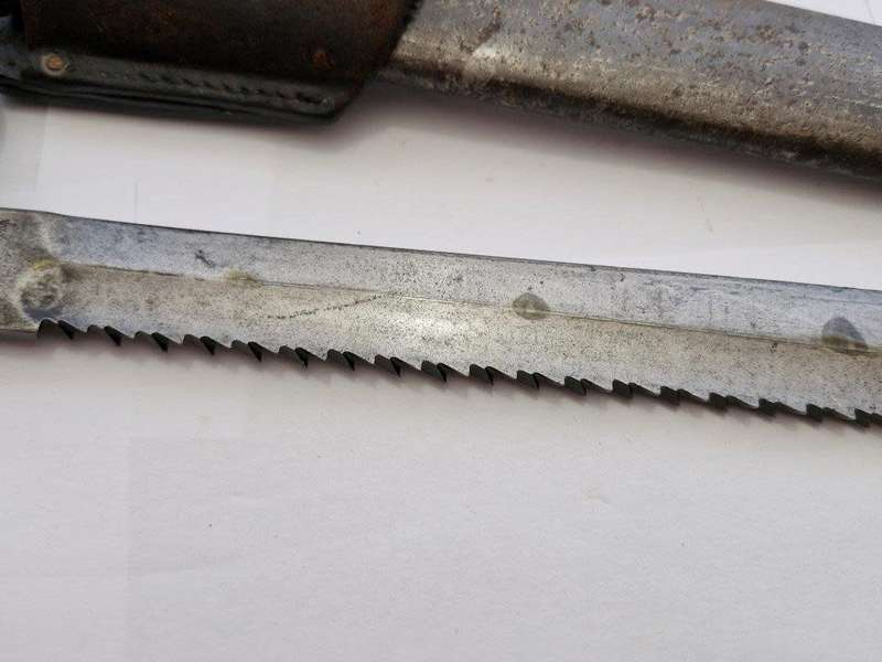 WWI German S98/05 Sawback butcher bayonet with 4th infantry company knot. Mauser AG 1916.