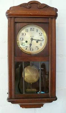 ATTRACTIVE OLD WALL CLOCK."STRAND".WORKING.Pls see all images for description