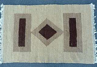VINTAGE WOOLEN RUG.